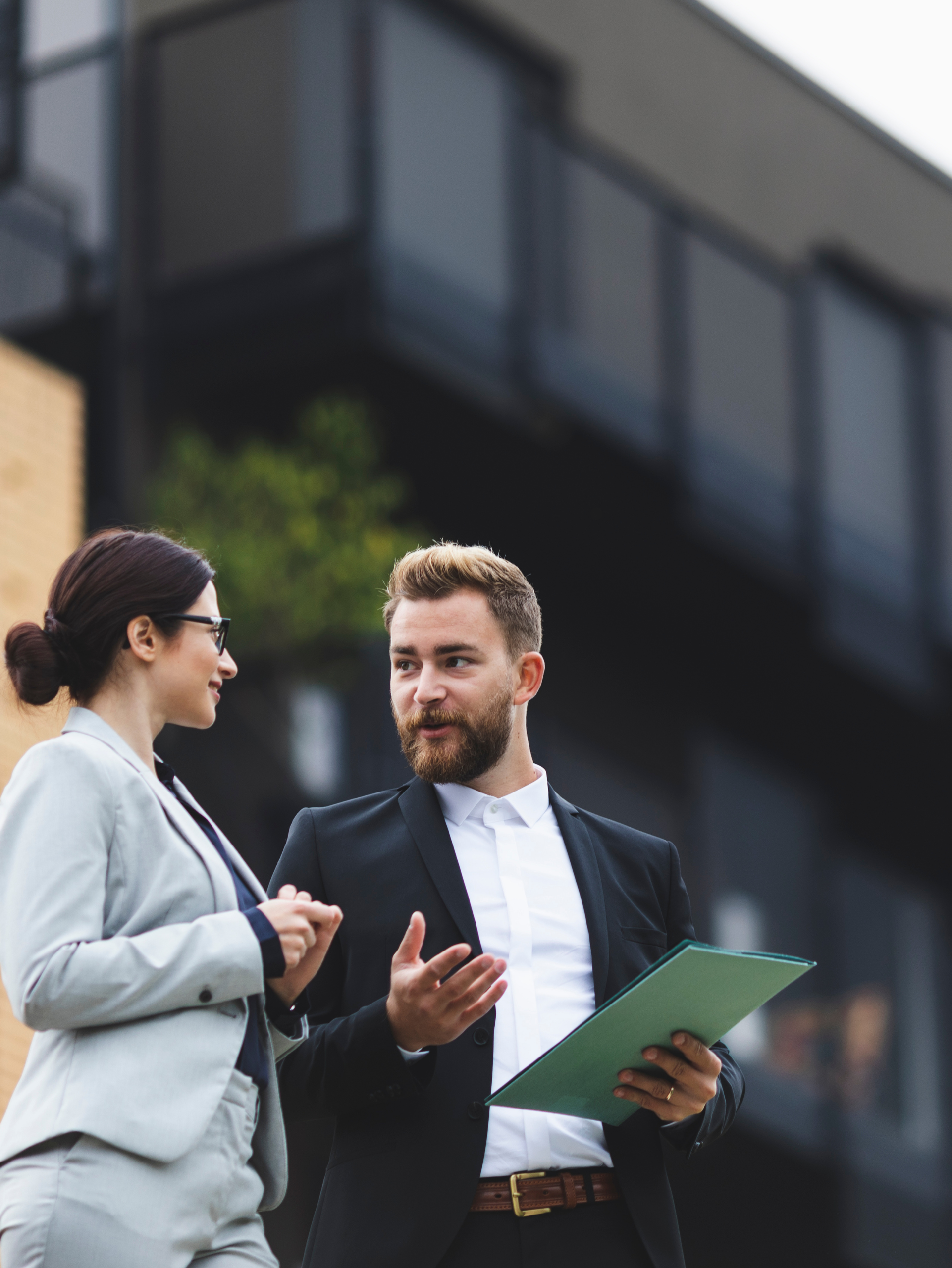 A real estate agent reviewing a digital marketing plan for property listings.